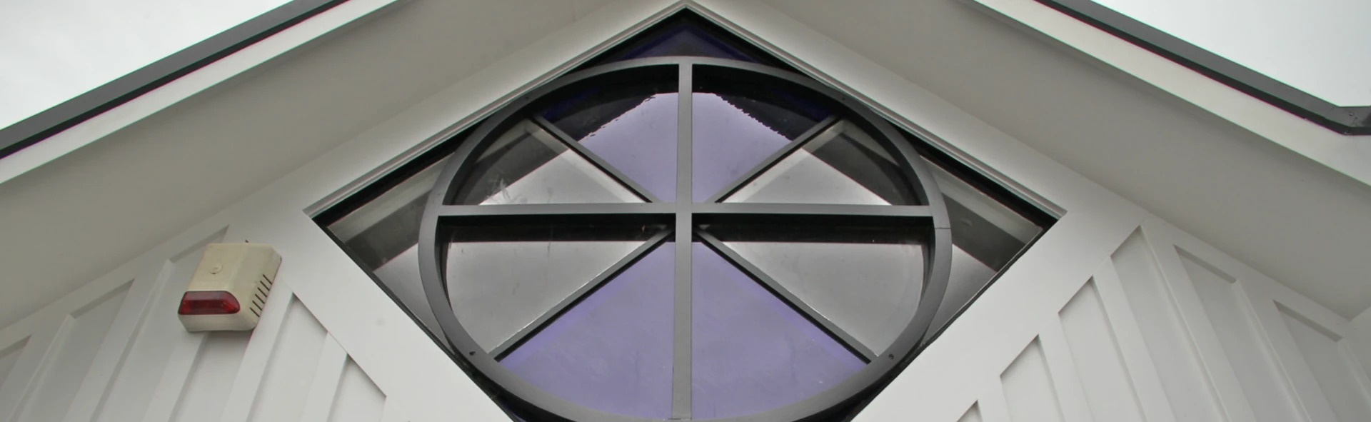 The circular window set into the gable at 788 Remuera Road